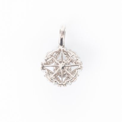 White gold pendant stylizing a flower adorned...