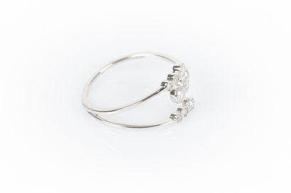 White gold ring set with 9 round diamonds....
