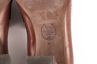 INES DE LA FRESSANGE. Pair of brown leather...