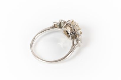 Platinum ring set with a brilliant-cut diamond...