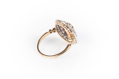 Two-tone gold daisy ring set with an oval...