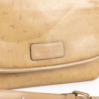 LANCEL. Shoulder bag in coated canvas. (wear)....