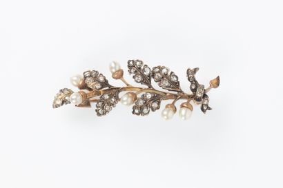 Gold and silver brooch in the shape of an...