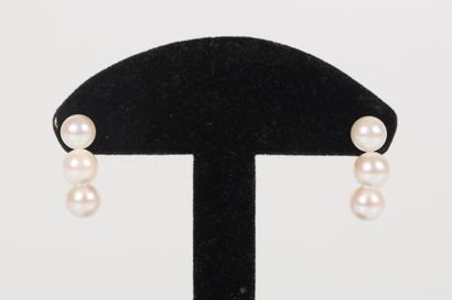 Pair of yellow gold earrings adorned with...