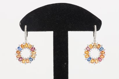Pair of earrings decorated with two spheres...