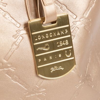 LONGCHAMP. Tote handbag in smooth gold leather....