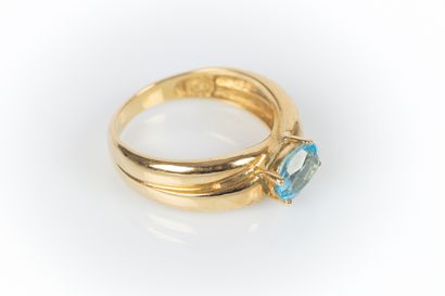Yellow gold ring with two crossed wedding...