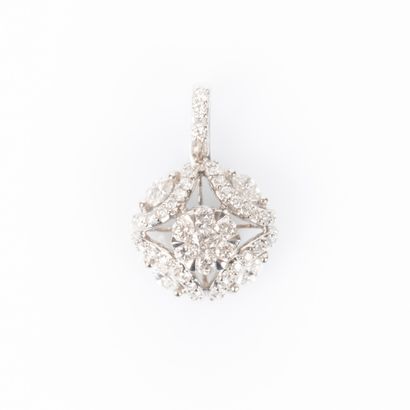 White gold pendant stylizing a flower adorned...