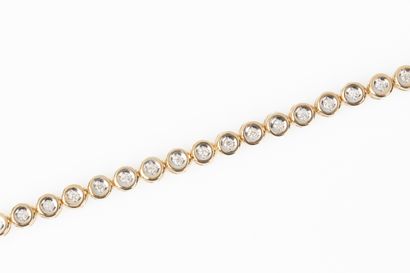 Line bracelet in yellow gold set with 40...
