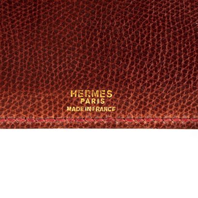 HERMES. Bordeaux grained leather agenda holder...