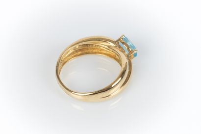 Yellow gold ring with two crossed wedding...