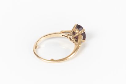 BOUCHERON. Gold ring set with an oval ruby...