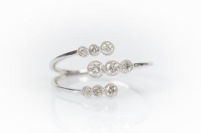 White gold ring set with 9 round diamonds....