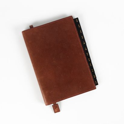 HERMES. Bordeaux grained leather agenda holder...