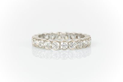 White gold wedding band set with white stones...
