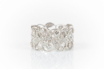 White gold ring with stylized foliage set...