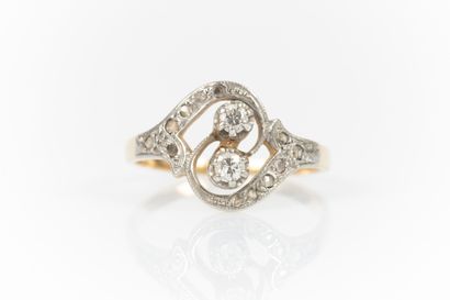 Bague toi et moi en or sertie de petits diamants....