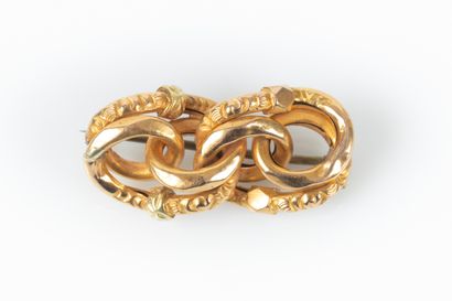 Broche entrelacs en or. Soudure, l'épingle...