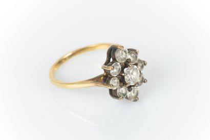 Bague marguerite en or et argent sertie de...