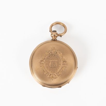 Montre de col en or guilloché et gravé d'un...