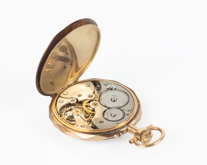 Montre de poche en or, le cache-poussière...
