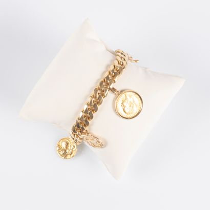 Bracelet en or maille gourmette agrémenté...