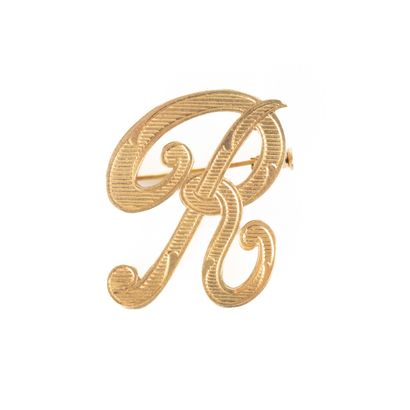 Broche en or en forme de R. 6,34 g. 3 cm...