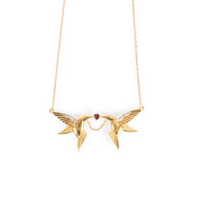Collier en or serti de petites pierres à...