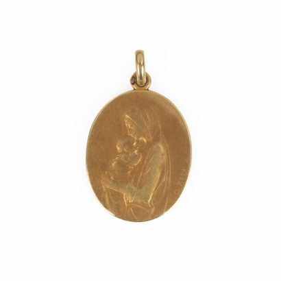 Médaille en or: Vierge à l'Enfant. Gravée....