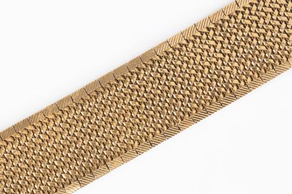 Bracelet manchette souple en or maille fantaisie...