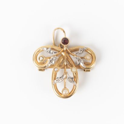 Broche pendentif en or sertie de petites...