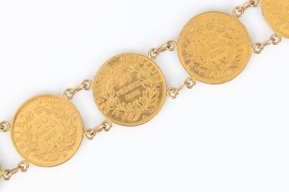 Bracelet en or serti de 7 monnaies en or...