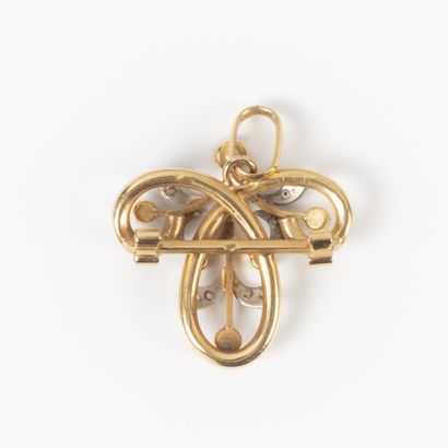 Broche pendentif en or sertie de petites...