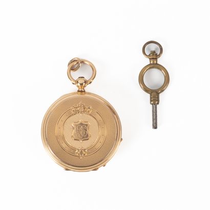 Montre de col en or guilloché et gravé d'un...
