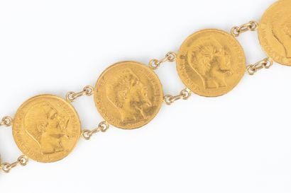Bracelet en or serti de 7 monnaies en or...