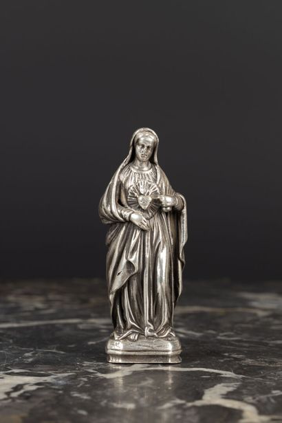 Vierge Marie montrant le coeur sacré en argent....