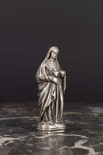 Vierge Marie montrant le coeur sacré en argent....