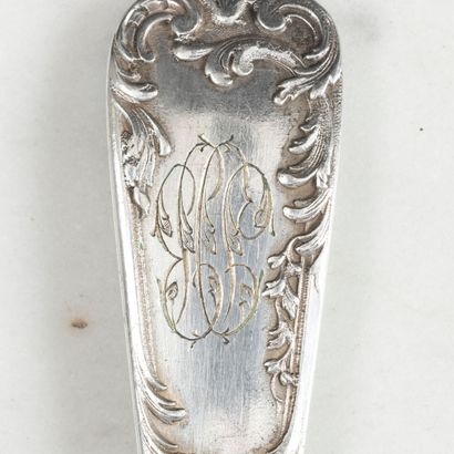 Ensemble de couverts en argent à décor rocaille,...