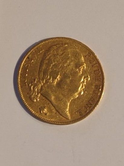 1 monnaie en or : 20 F 1822 A Louis XVII...