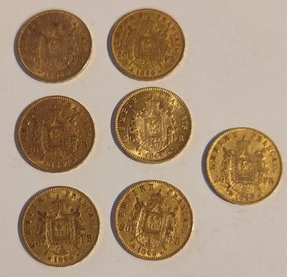 7 monnaies en or : 20 F Napoléon III tête...