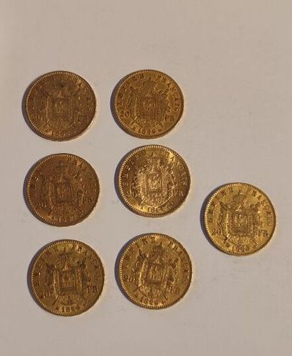 7 monnaies en or : 20 F Napoléon III tête...