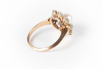 Bague marguerite en or de deux tons sertie...