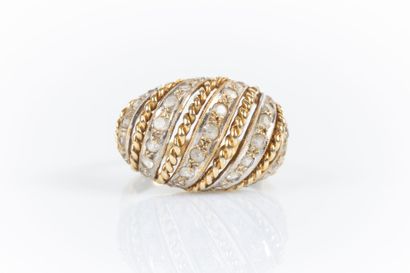 Bague boule en or de deux tons sertie de...