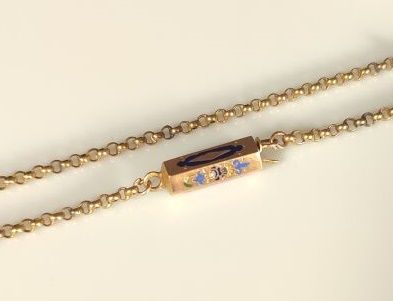 Gold round link chain, clasp with enamel...