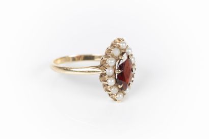 9k gold marquise ring set with a marquise-cut...