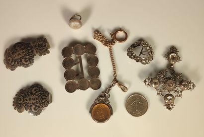 Antique jewelry set:
- silver coat buckle...