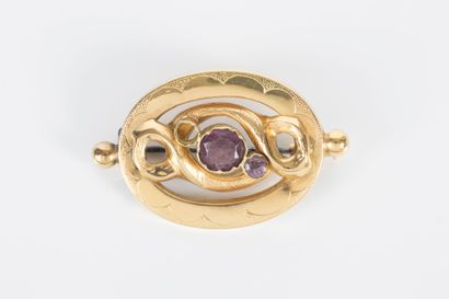 Broche en or sertie d'améthystes (manque...
