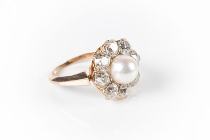 Bague marguerite en or de deux tons sertie...