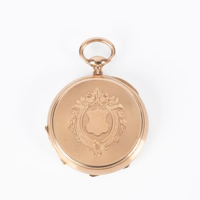 Montre de poche en or guilloché et gravé...