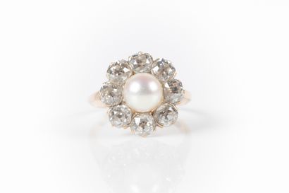 Bague marguerite en or de deux tons sertie...